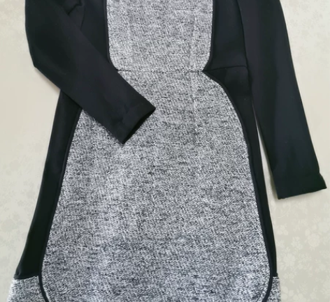 修身包臀连衣裙 服装款式细节:拼接 裙型:...