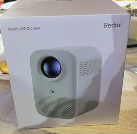 出Redmi投影仪2绿色,品牌为小米,是一...