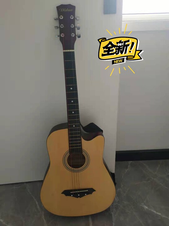 全新蒂朵38寸民谣吉他一把，买来没时间弹全...