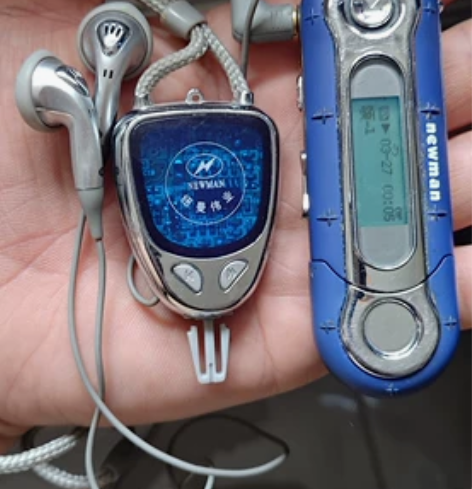 纽曼知音mp3播放器，挂绳耳机带收音机功能...
