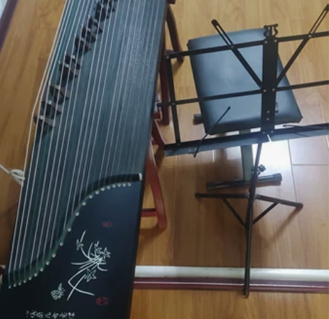 古筝一部,成色如图,350元,东丽万达附近...