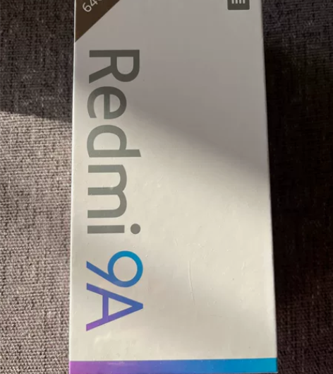 1台红米9A手机,砂石黑,4+64g,全新...