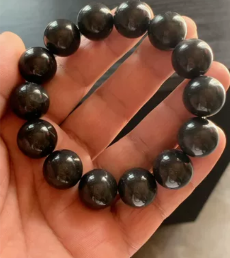 这块是义乌江捡的石头漆黑发亮,自己加工的手...