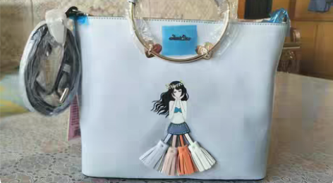 包邮欧时纳女款包规格27×23×9厘米，全...