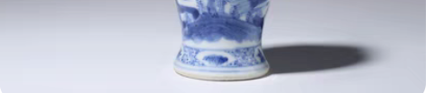 此件清晚·青花渔樵耕读纹鸡腿瓶，款识：康熙...